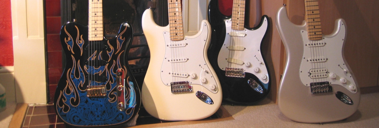 Some of my Fenders: James Burton Artist Series Tele, American Standard Strat, Eric Clapton Artist Series Strat, American Standard HSS Strat